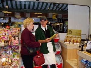 Elizabeth E. buys the first set of candles at Fisher's