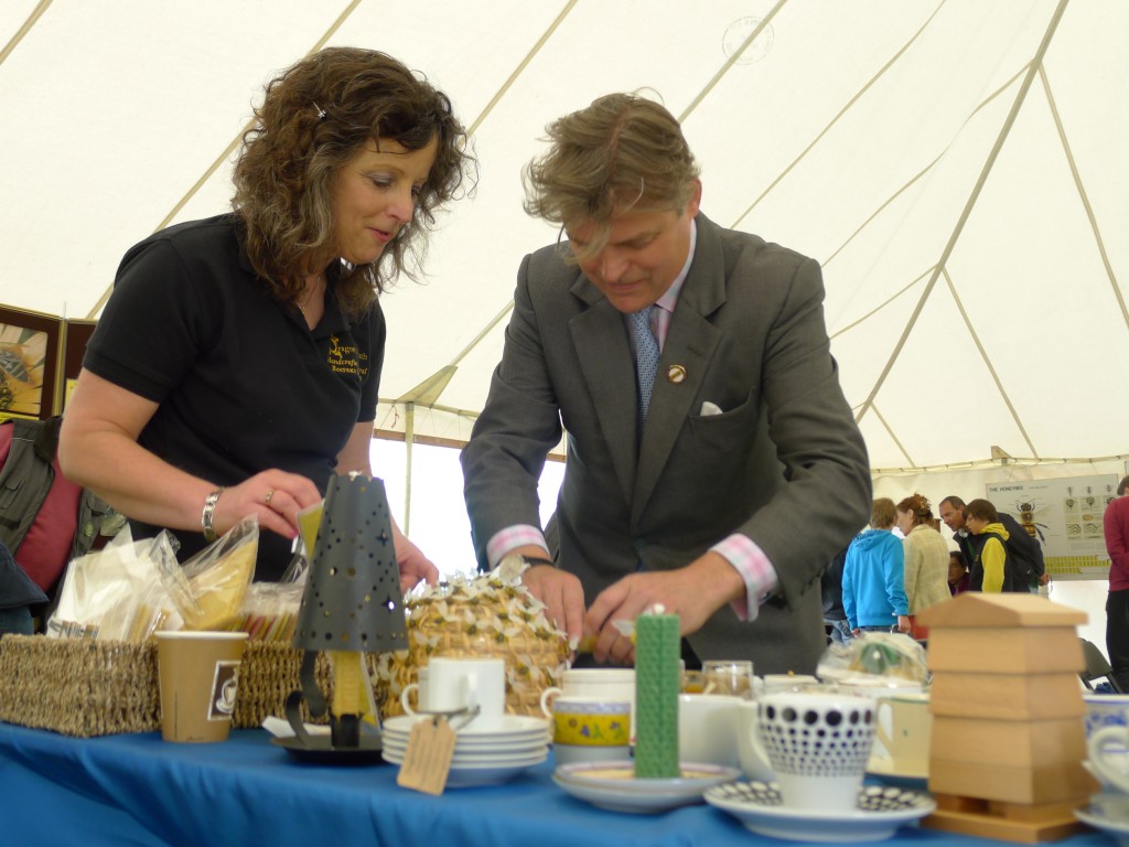 Lord Carnarvon rolls beeswax candles